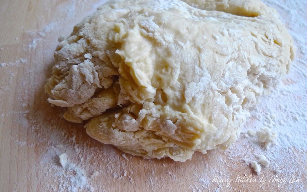 Then turn it out onto a lightly floured board.