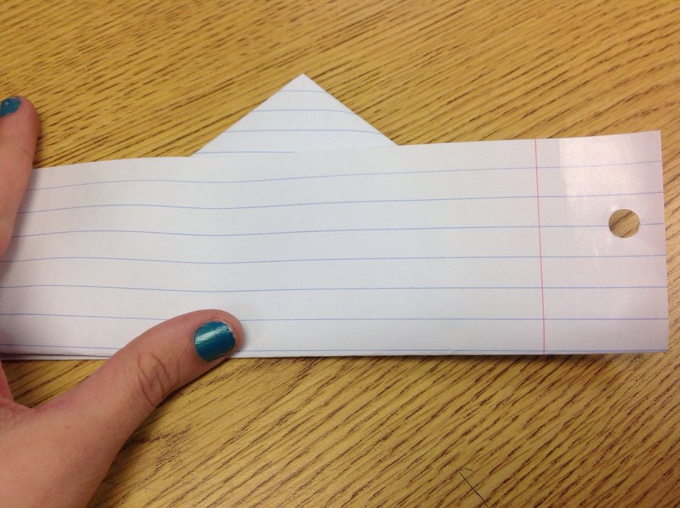 Then turn over and take extra paper and fold up align once again