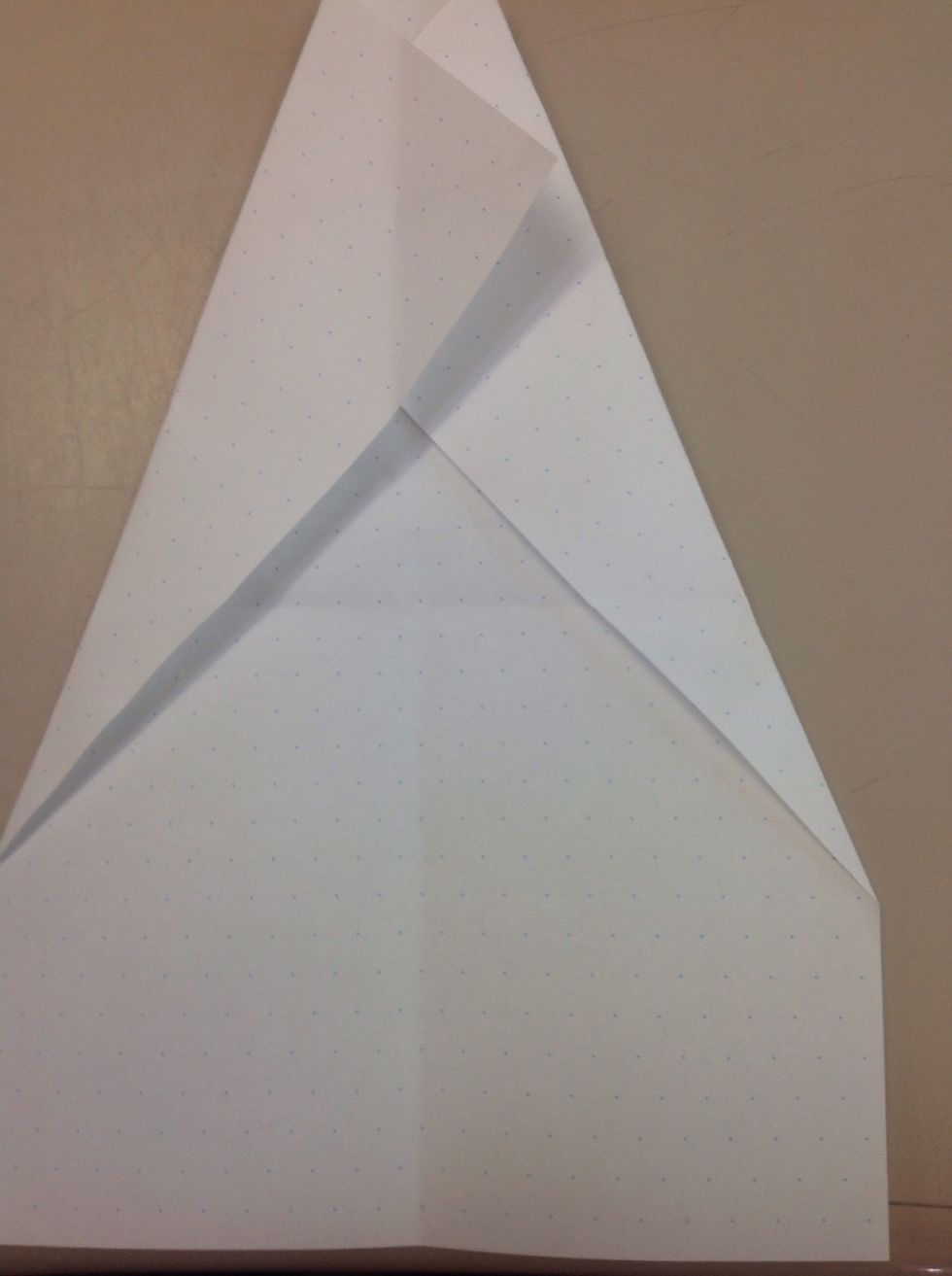 Then turn the corners into the fold line so that they touch