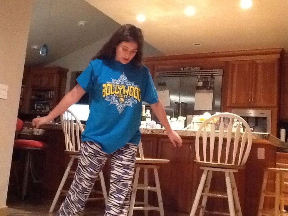 Then twist your body forward. Your glove hand should be coming up to tuck in to your side. Your ball hand should be ready to throw the ball.