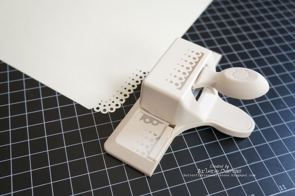 ... then use the border punch to punch the edges of the card stock.