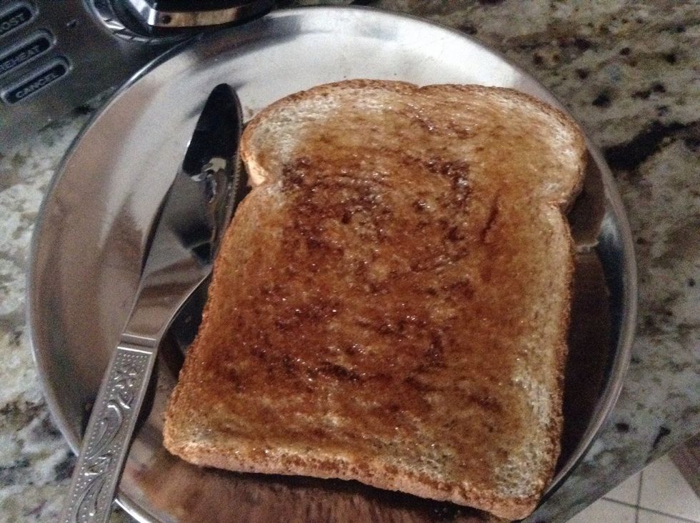 Then use your knife to spread the syrup on the bread