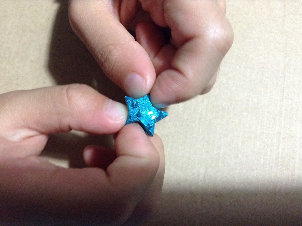 Then use your nails to make the middle of each side to point to the center.