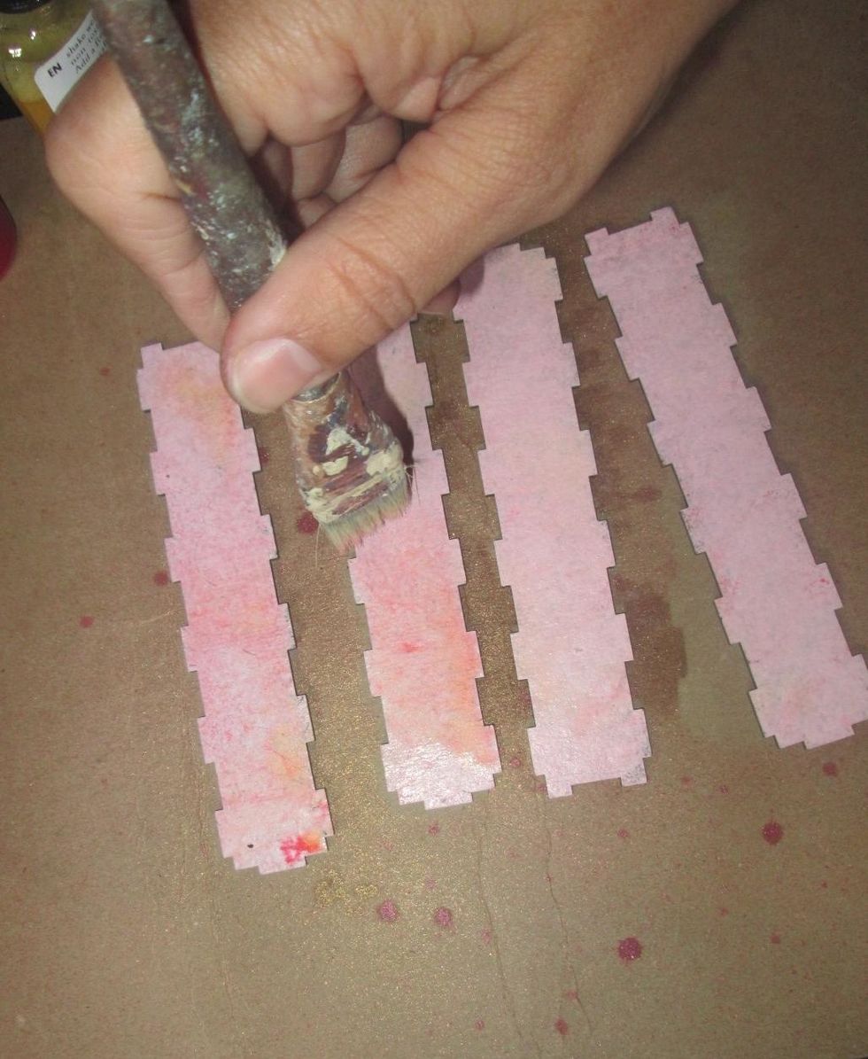 Then, using a stiff brush, I dabbed the colors to blend and unify.