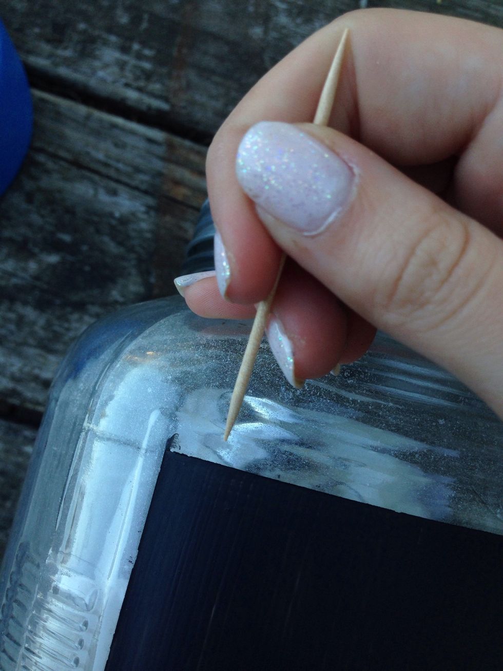 Then using a toothpick I gently scraped off any paint that adventured under the tape