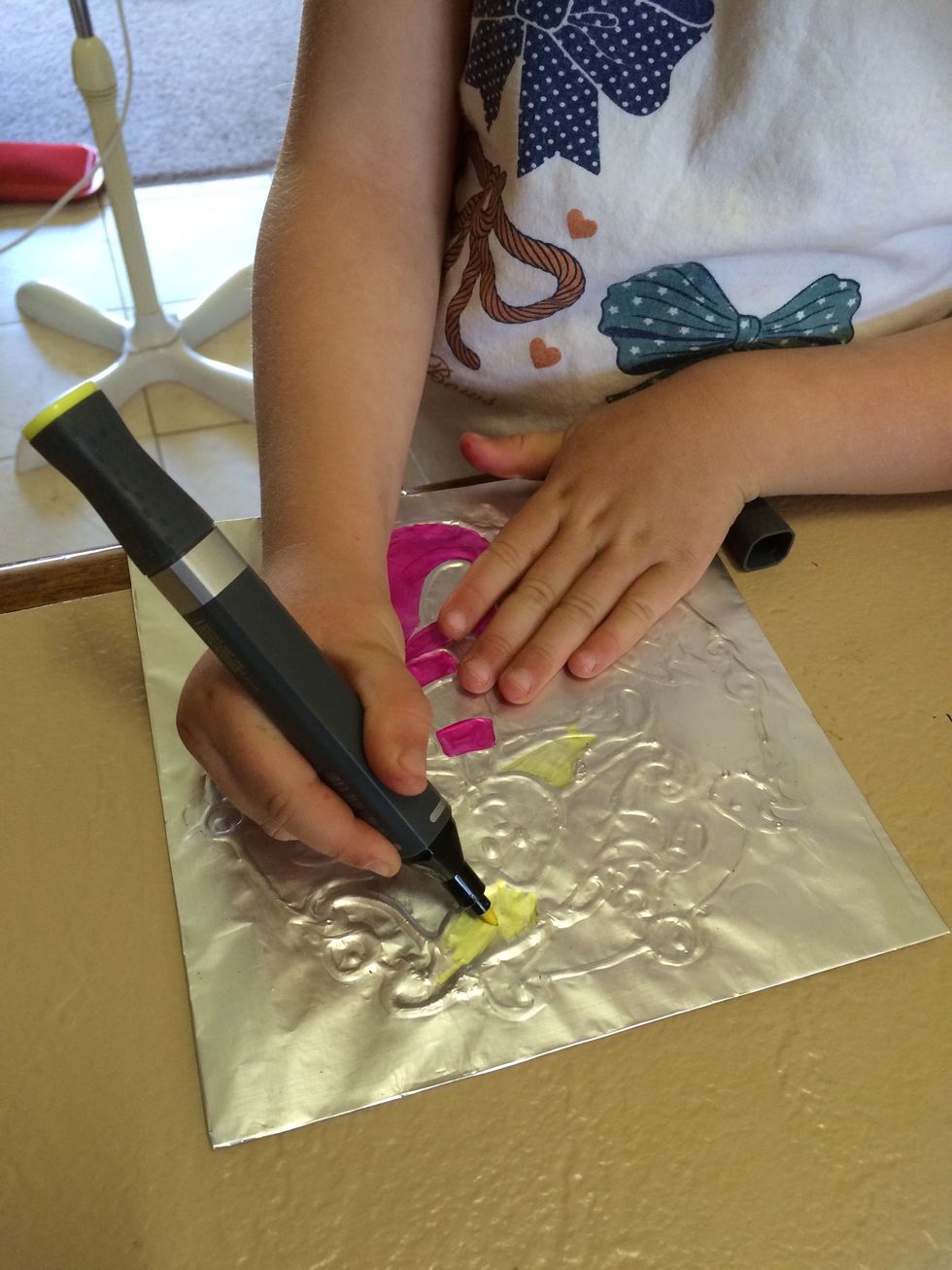 Then using Mepxy Markers colour in leaving the raised glue foil without colour.