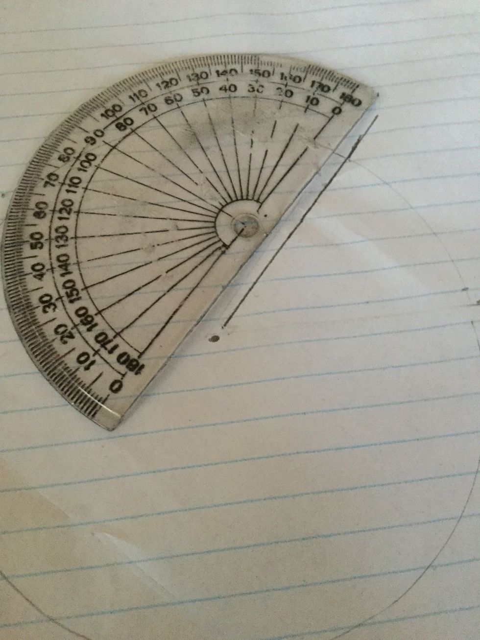 Then using the straight side of your protractor connect the center point with the mark you just drew