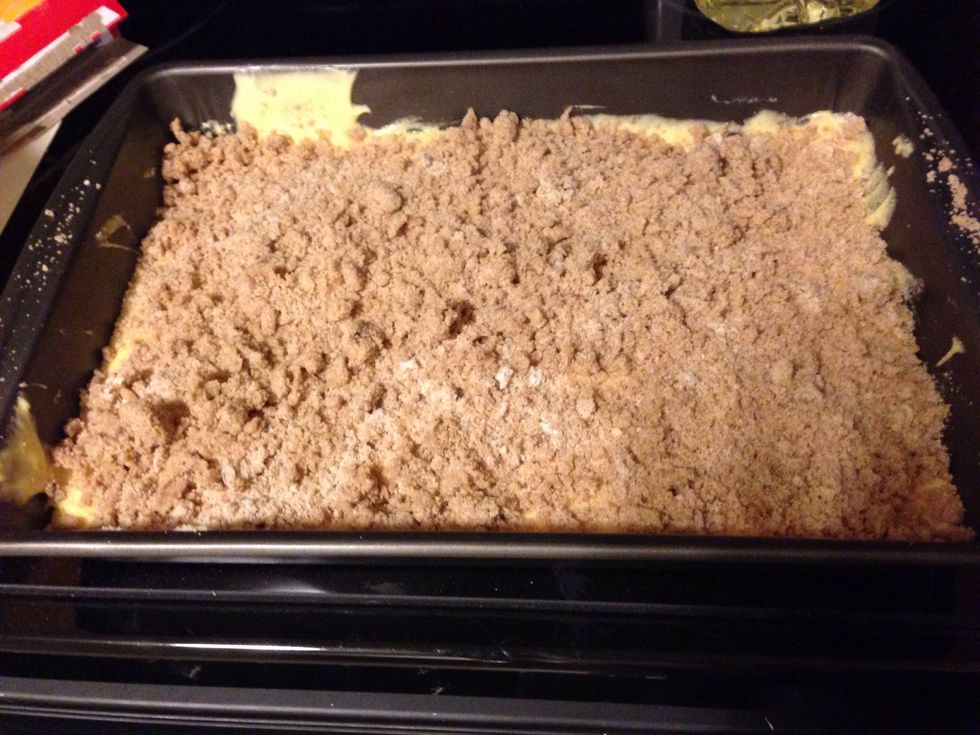 Then using your hands sprinkle that topping all over cake mix