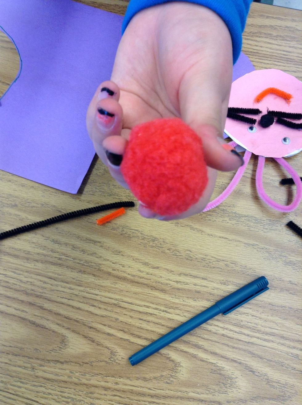 Then, we need to put a Pom Pom for the tail.