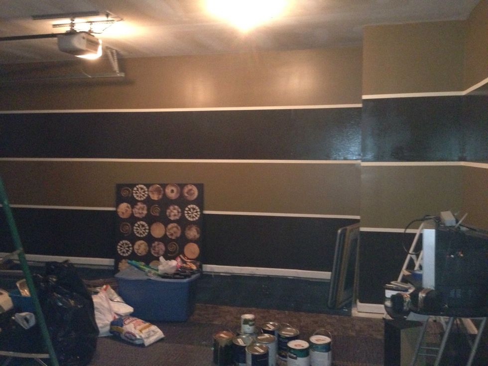 Then we paint our 2nd color of paint and as you can see in this , the artwork is where we pull our colors. Then after about two hours of drying time.. Pull off tape slowly