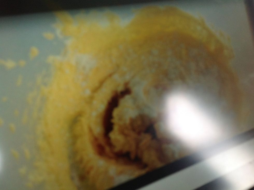 Then we we're told to put vanilla essence and flour with the sugar and butter and fold it.