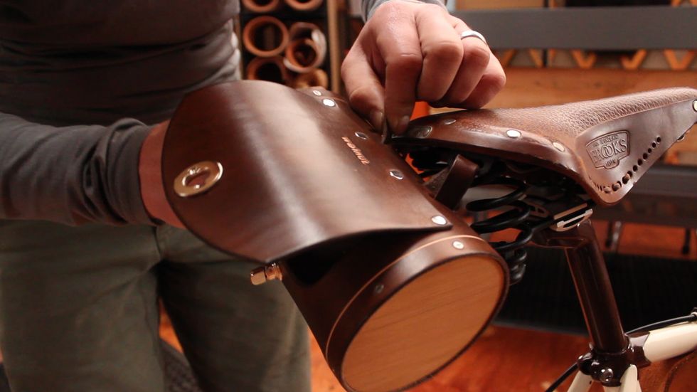 Then weave back out the 3rd bag slot.