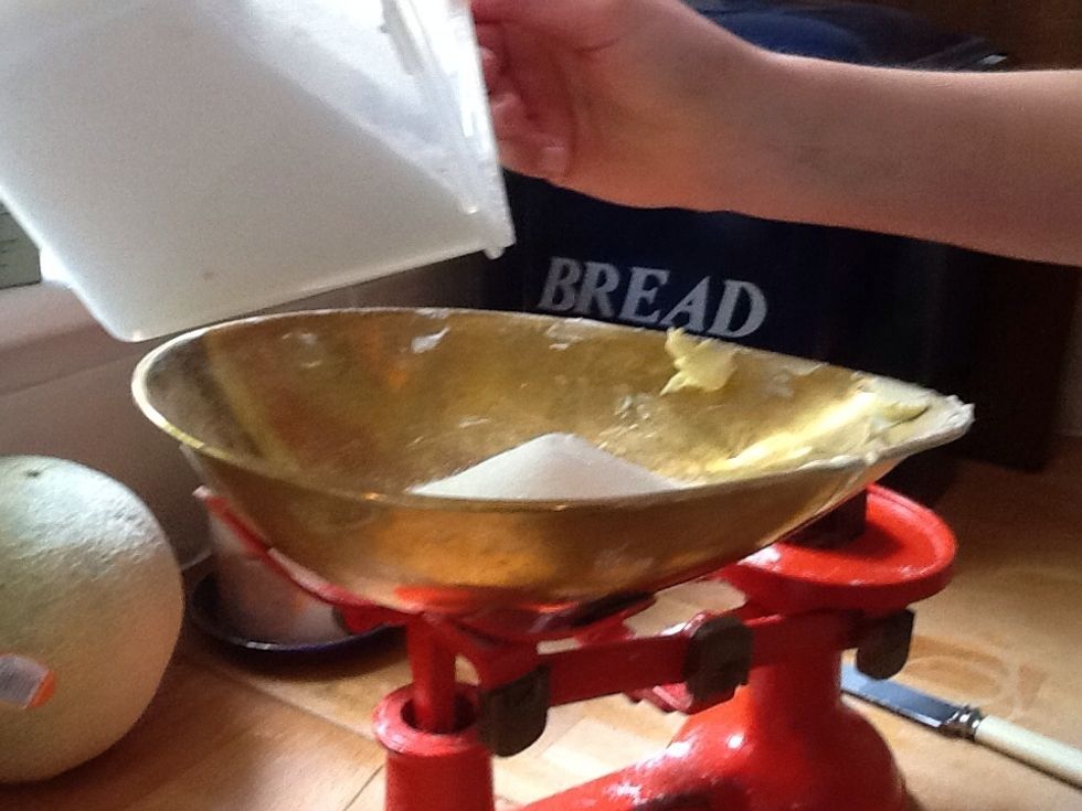 Then weigh 220g of caster sugar and put it in your mixing bowl or maja mix