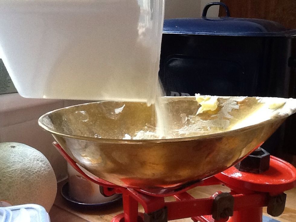 Then weigh out 220g of self-raising flower