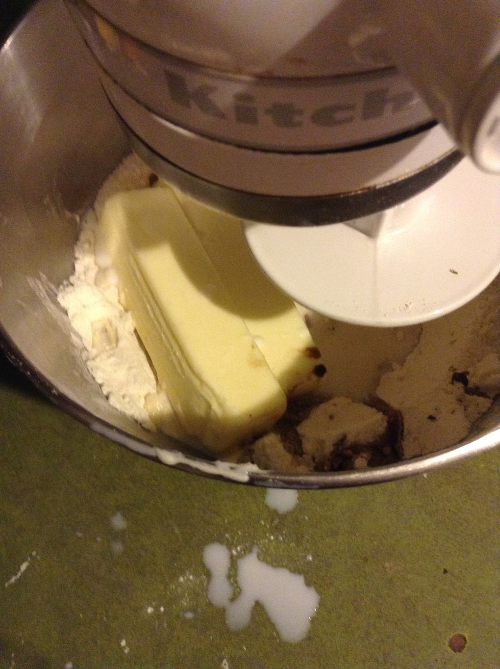 Then when all of the dry ingredients are all mixed,you add the butter,the eggs,vanilla extract  and milk as needed to make a soft dough.