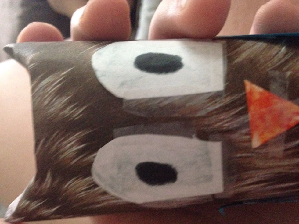 Then when you shape the eyes tape the sides.then draw some black dots for the eyes.