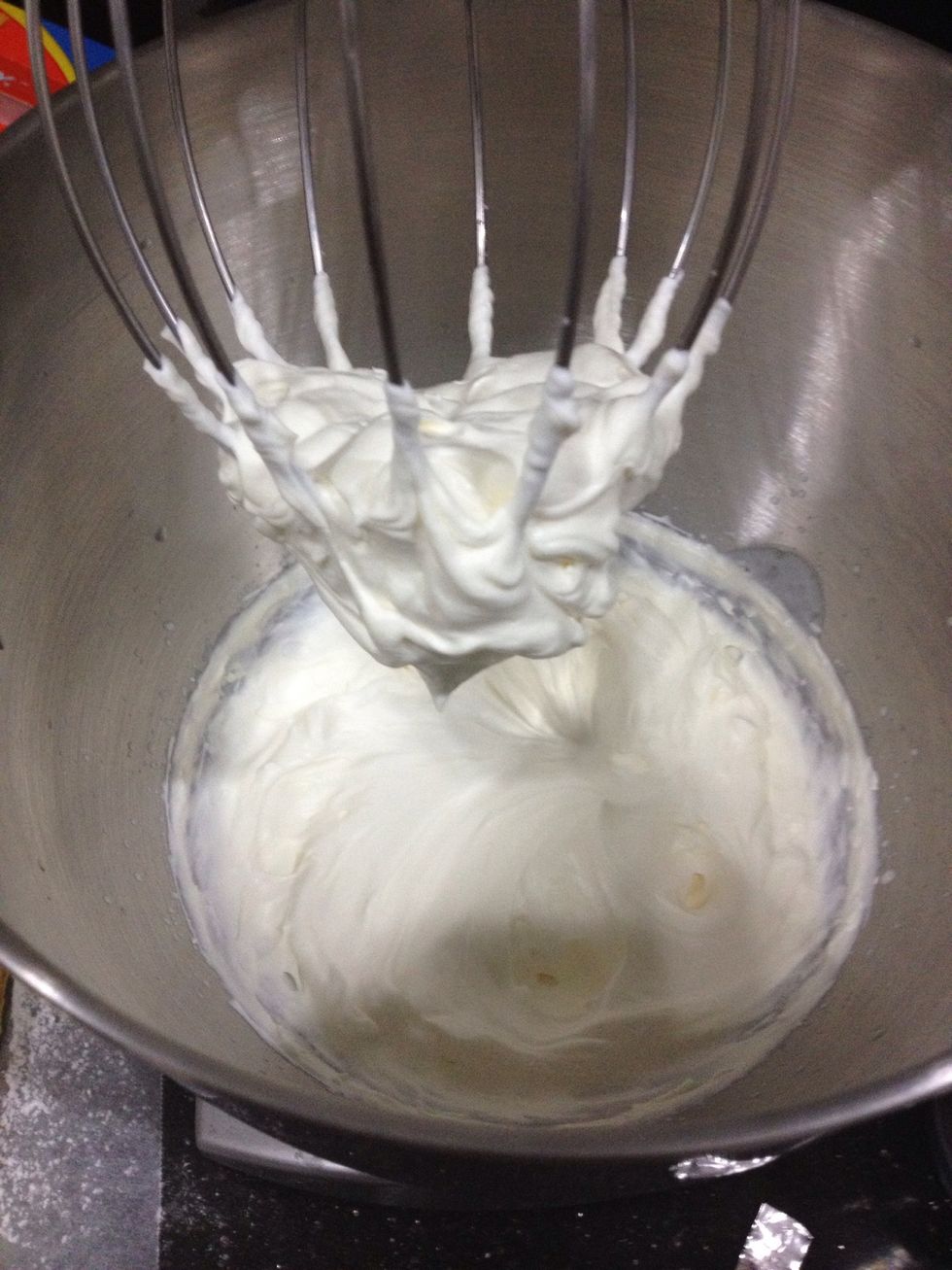 Then whip your heavy cream along with the icing sugar (one tbsp at a time) and vanilla extract till they form stiff peaks.