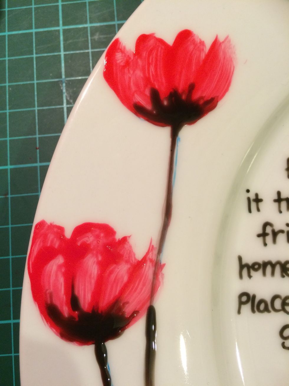 Then wile the red is still wet add some black for the base and stem