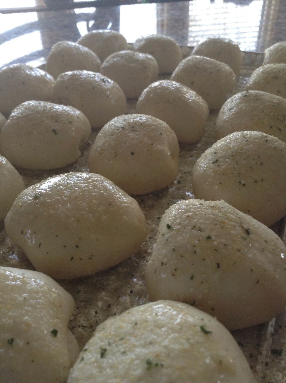 Then (with a heavy hand) sprinkle lots of garlic salt. NOT GARLIC POWDER. This is not interchangeable. Bake at 350, for about 20 minutes