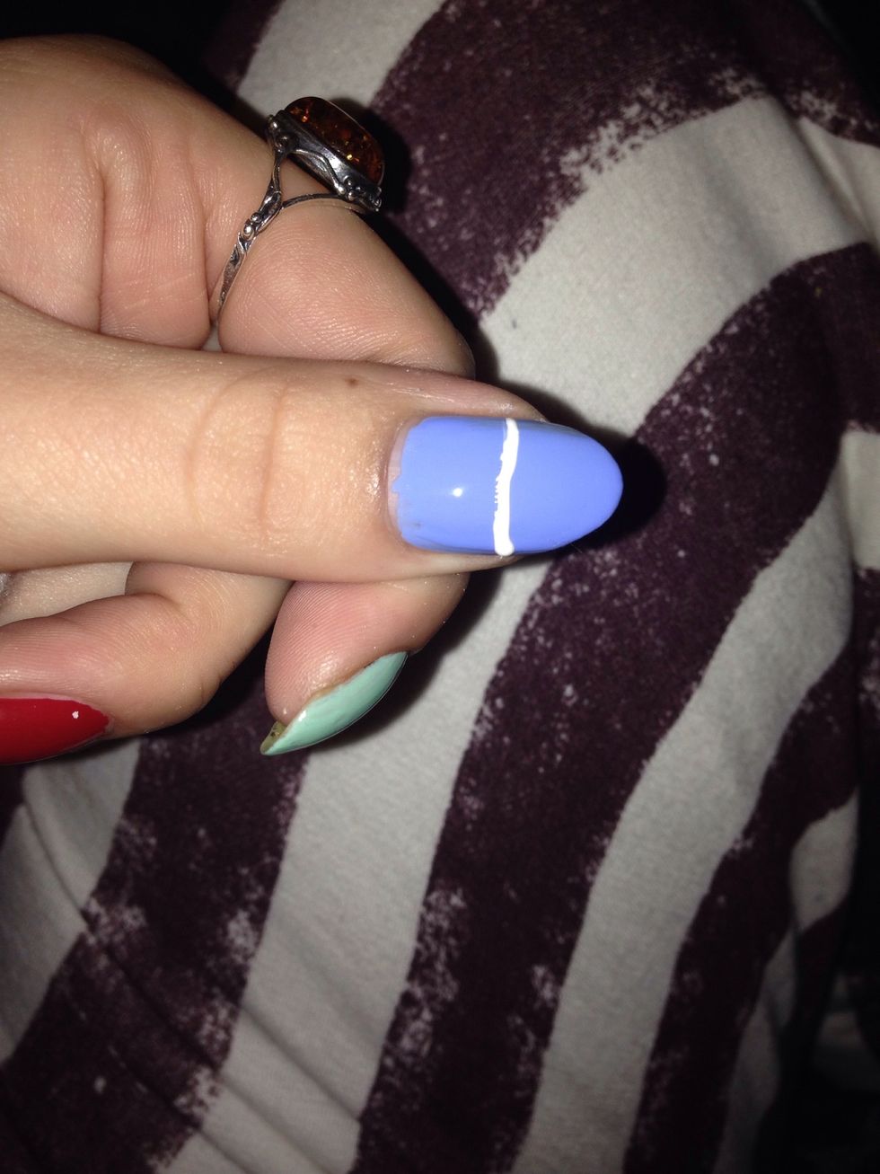 Then with a nail varnish brush create a line across your nail in white, doesn't have to be perfect you can neaten up later
