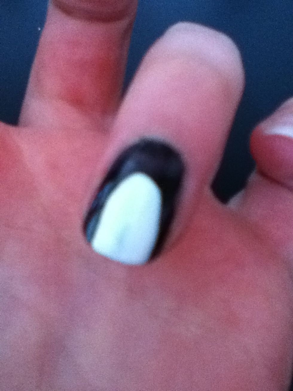 Then, with a white nail polish brush down the centre starting near the top of the nail.