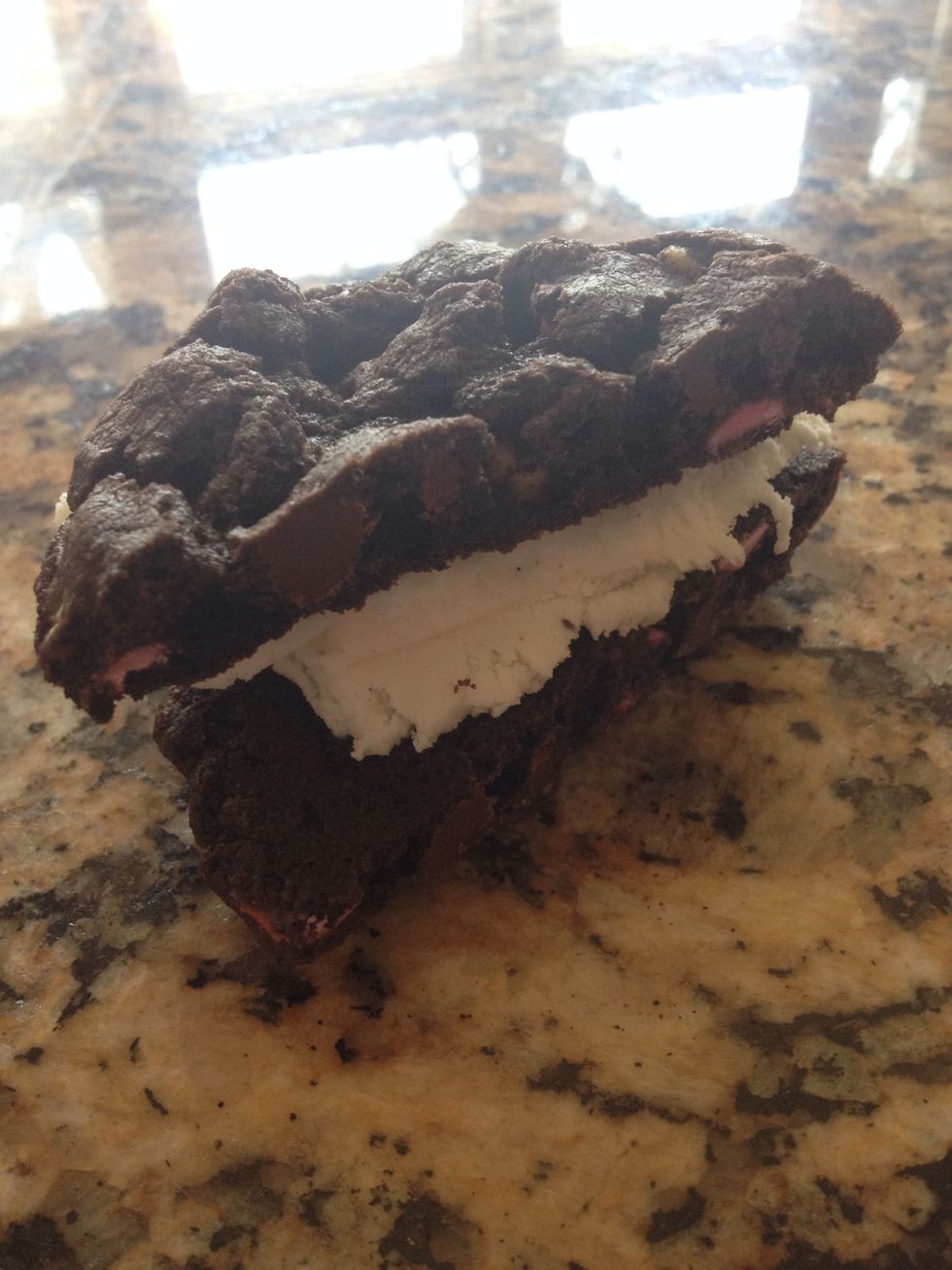 Then with one cookie, cut in half. Use your favorite ice cream (strawberry is wonderful with these kind!) but I went w vanilla bean