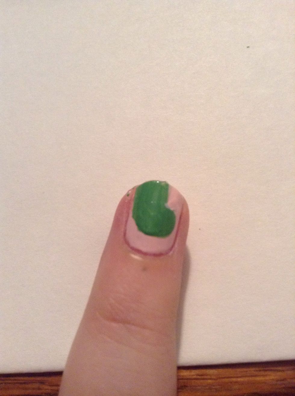 Then with the bottle brush again, make your dinosaur's head.