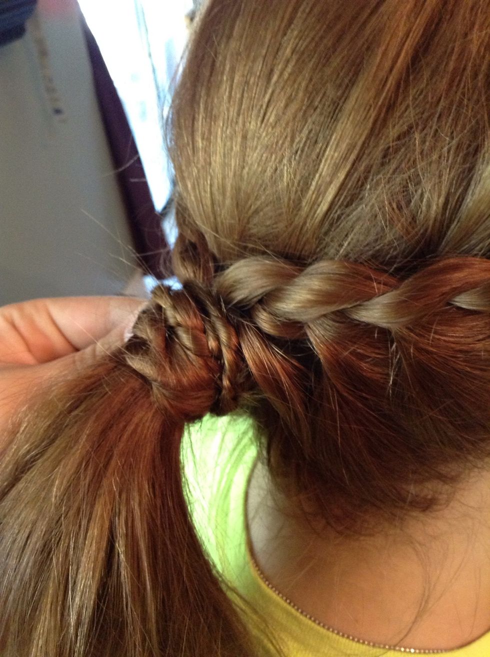 Then wrap it around the ponytail holder like this!