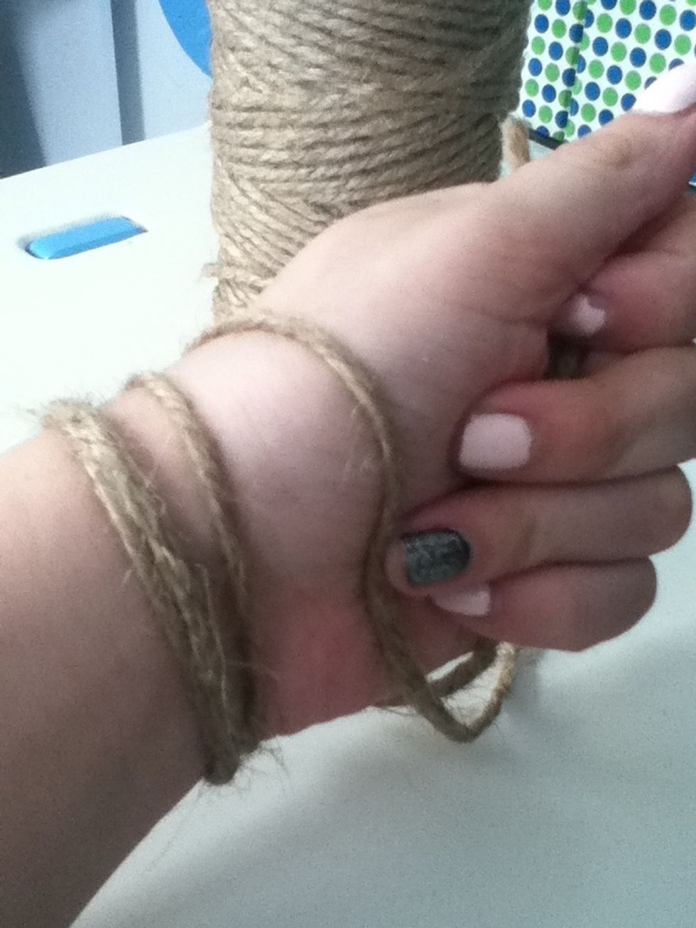 Then wrap the hemp around your wrist  3 times and then cut it off.