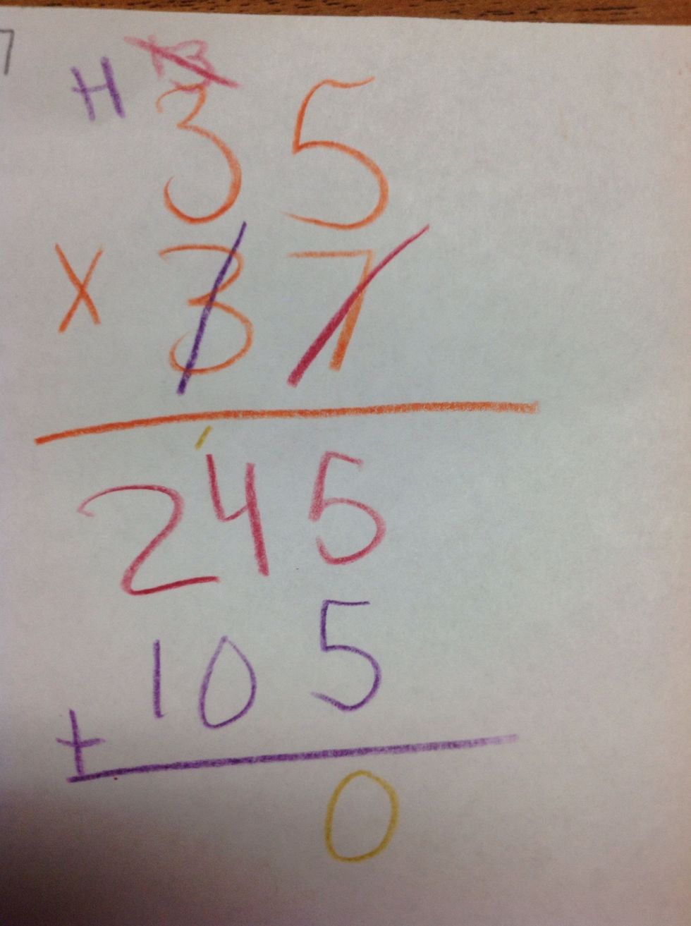 Then,you add the 245 and the 105 together but, you don't add them at one time. You add the 5+5=10, so I put my 0 under the 5's and carry the 1.