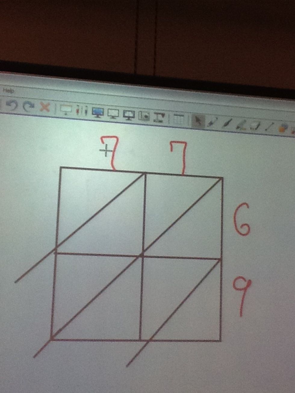 Then you add the numbers of your problem. For example, 77 times 69.