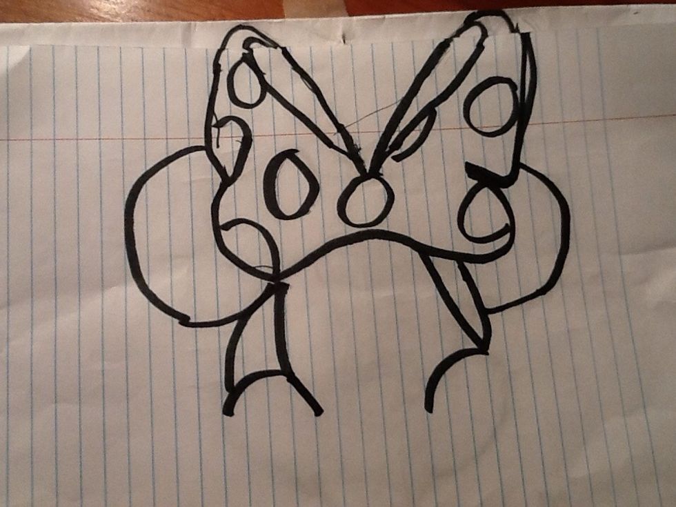 Then you are going to make her ears and start to make a little bit of her face like this
