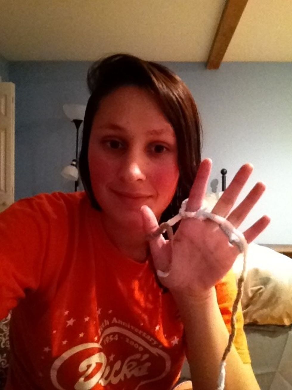 Then you can start bringing the loops over each finger again (like you saw on video).