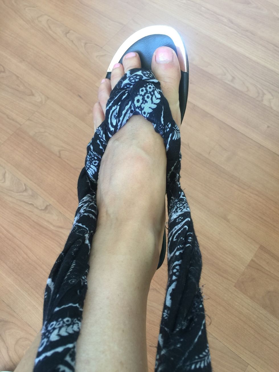 Then you can wear them, twisting the scarf all the way along your feet