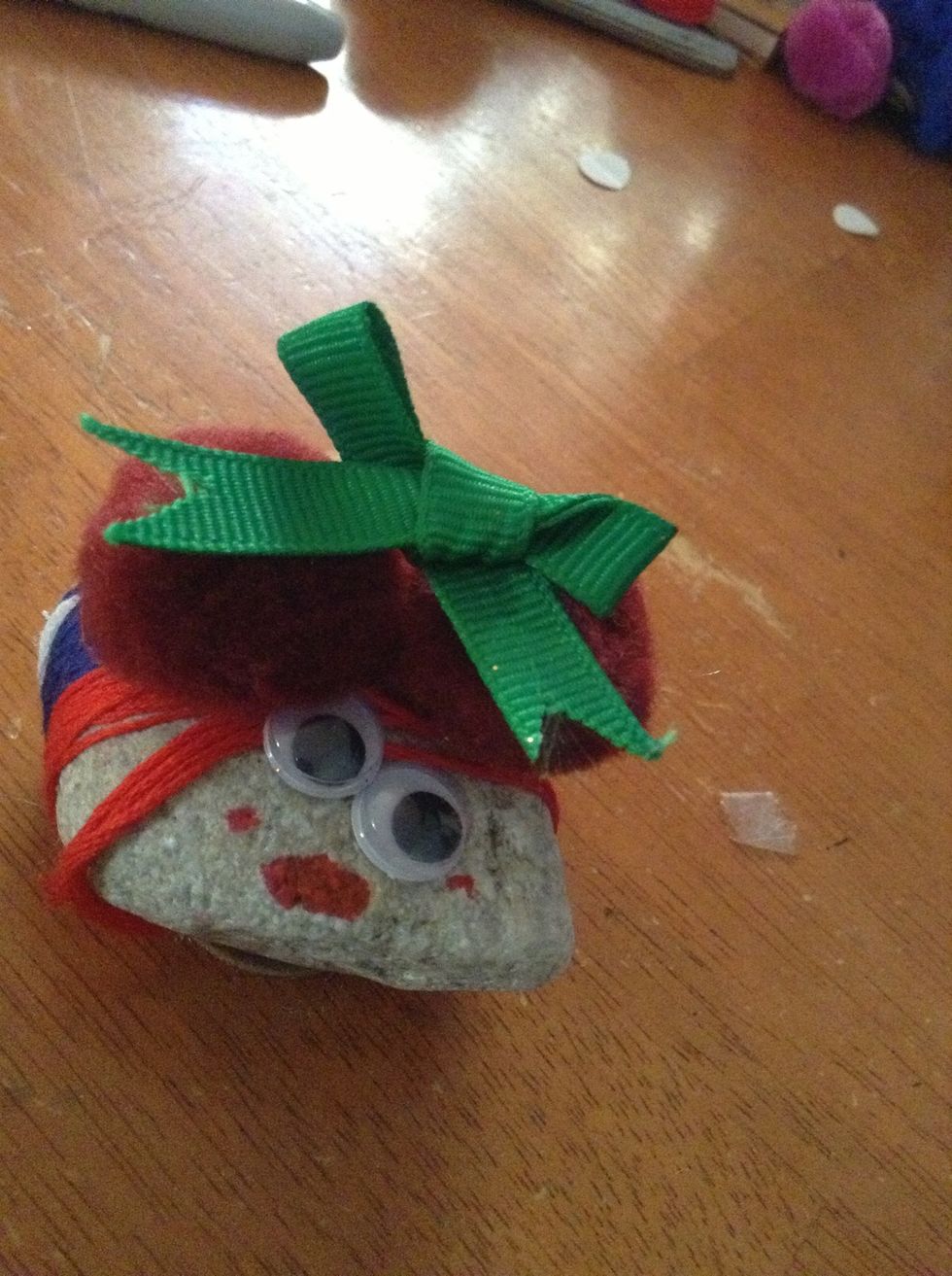 Then you could glue on a bow, this is a boy rock so I'm not gluing it on