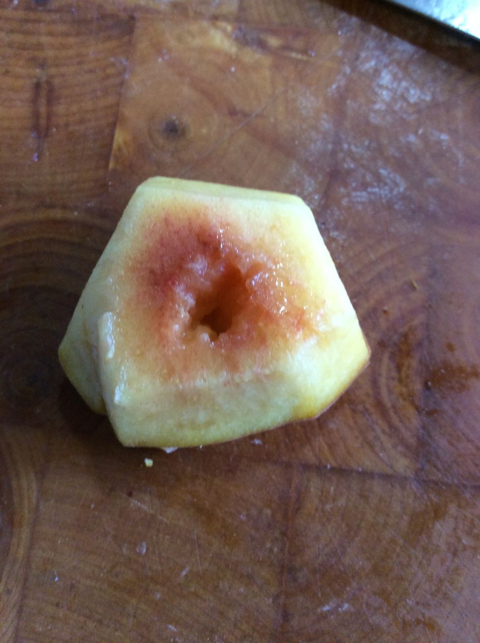 Then , you cut a hole in the top of the peach