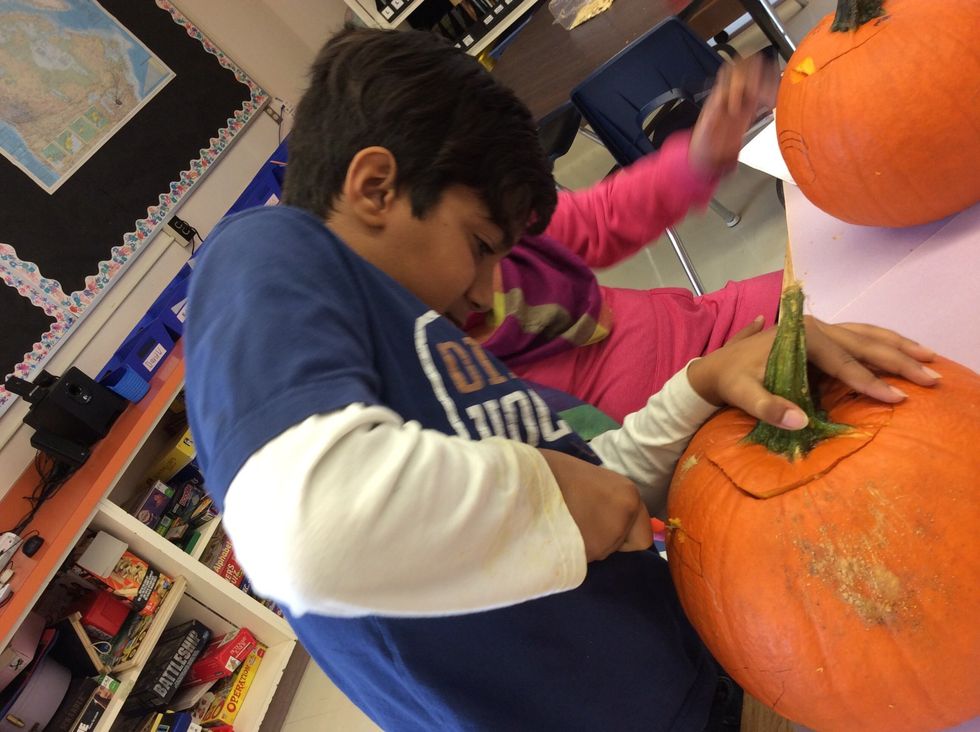 Then you cut the pumpkins face it it is a little bit hard