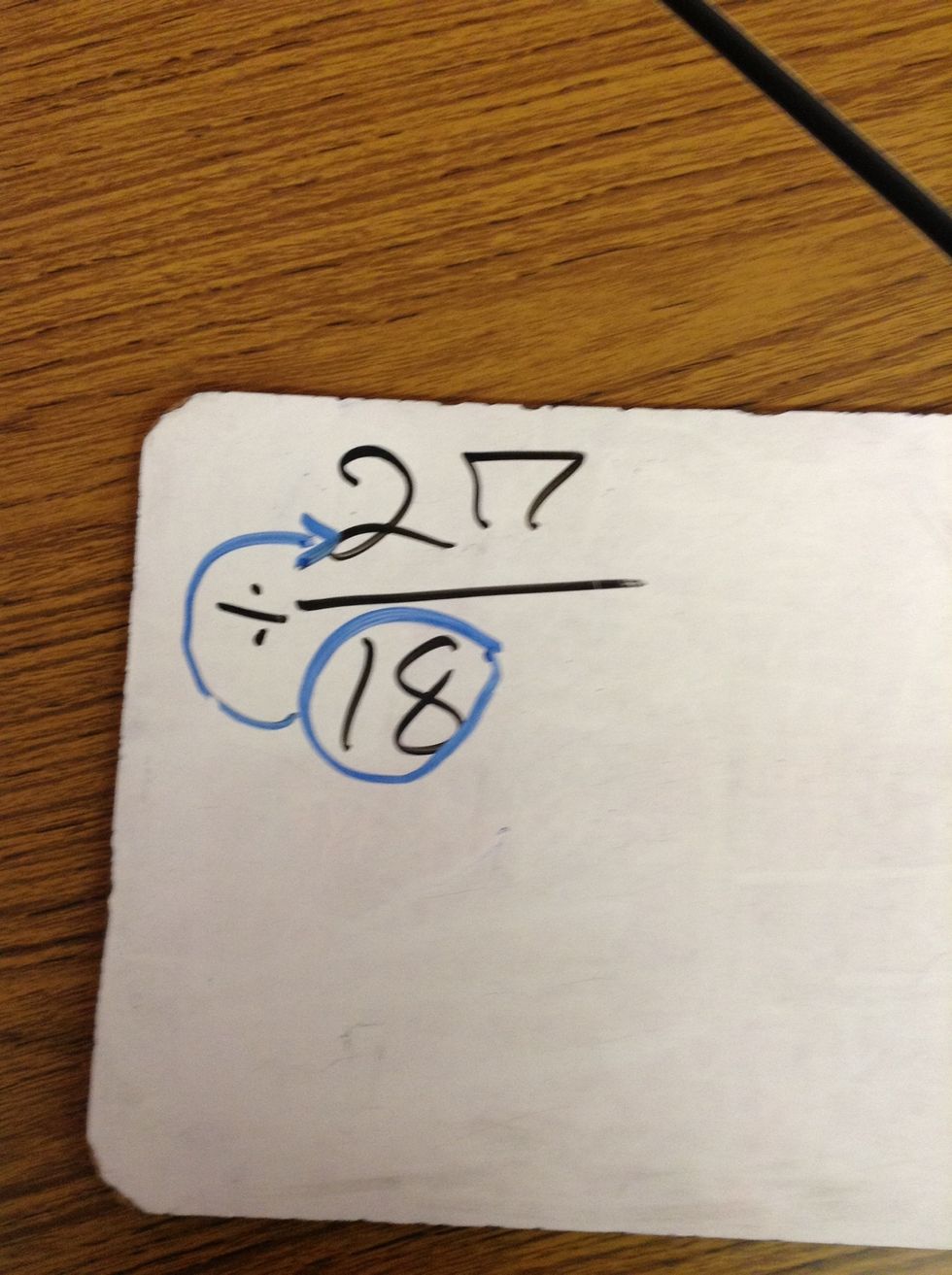 Then you divide 27 and 18