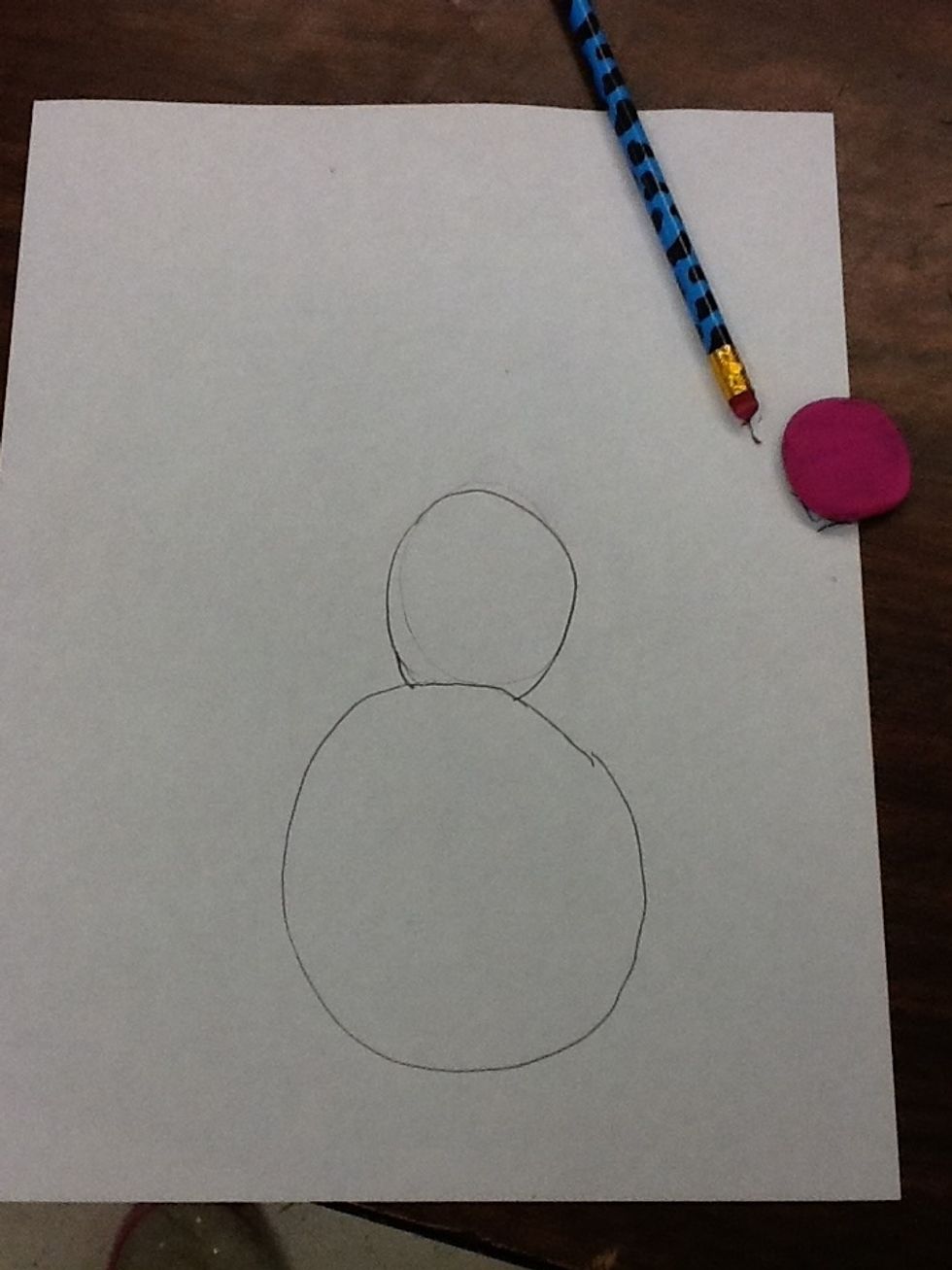 Then you draw a medium circle on top of the big one