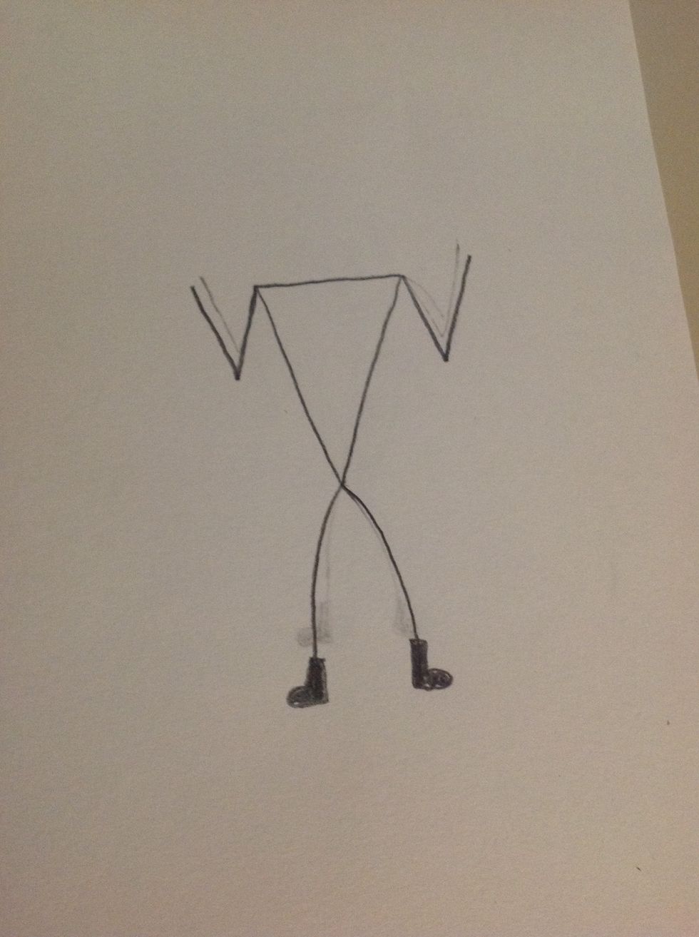 Then you draw the legs and arms in any shape you want. In this drawing I've got my stick figure with his arms in the air ' cause I'm going to draw guns.