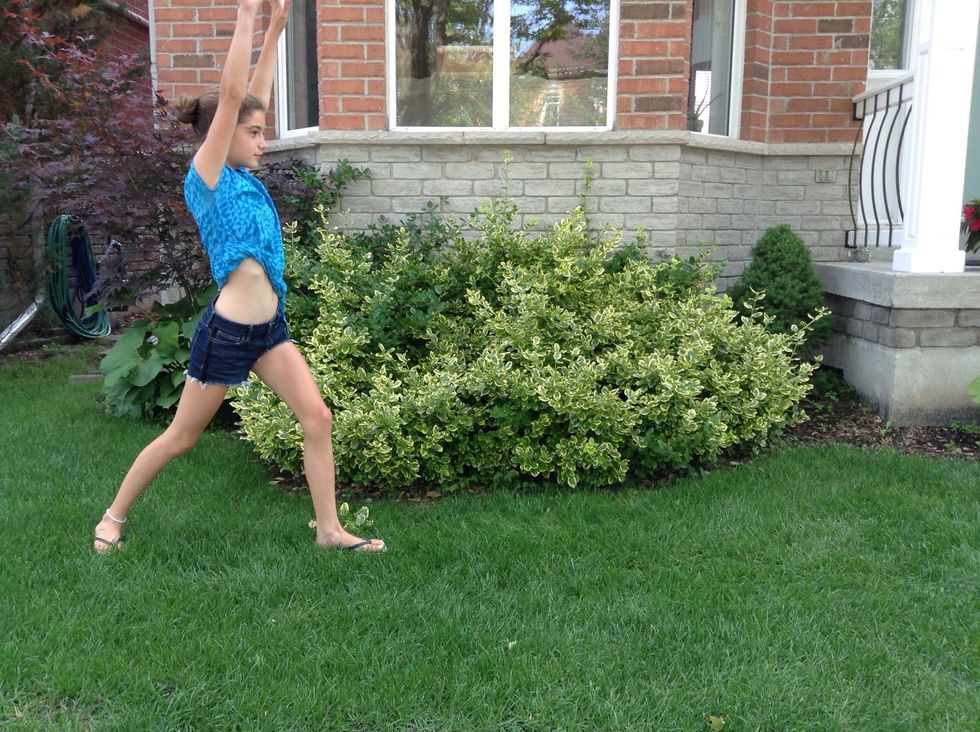 Then you end in a lunge with your arms beside your ears