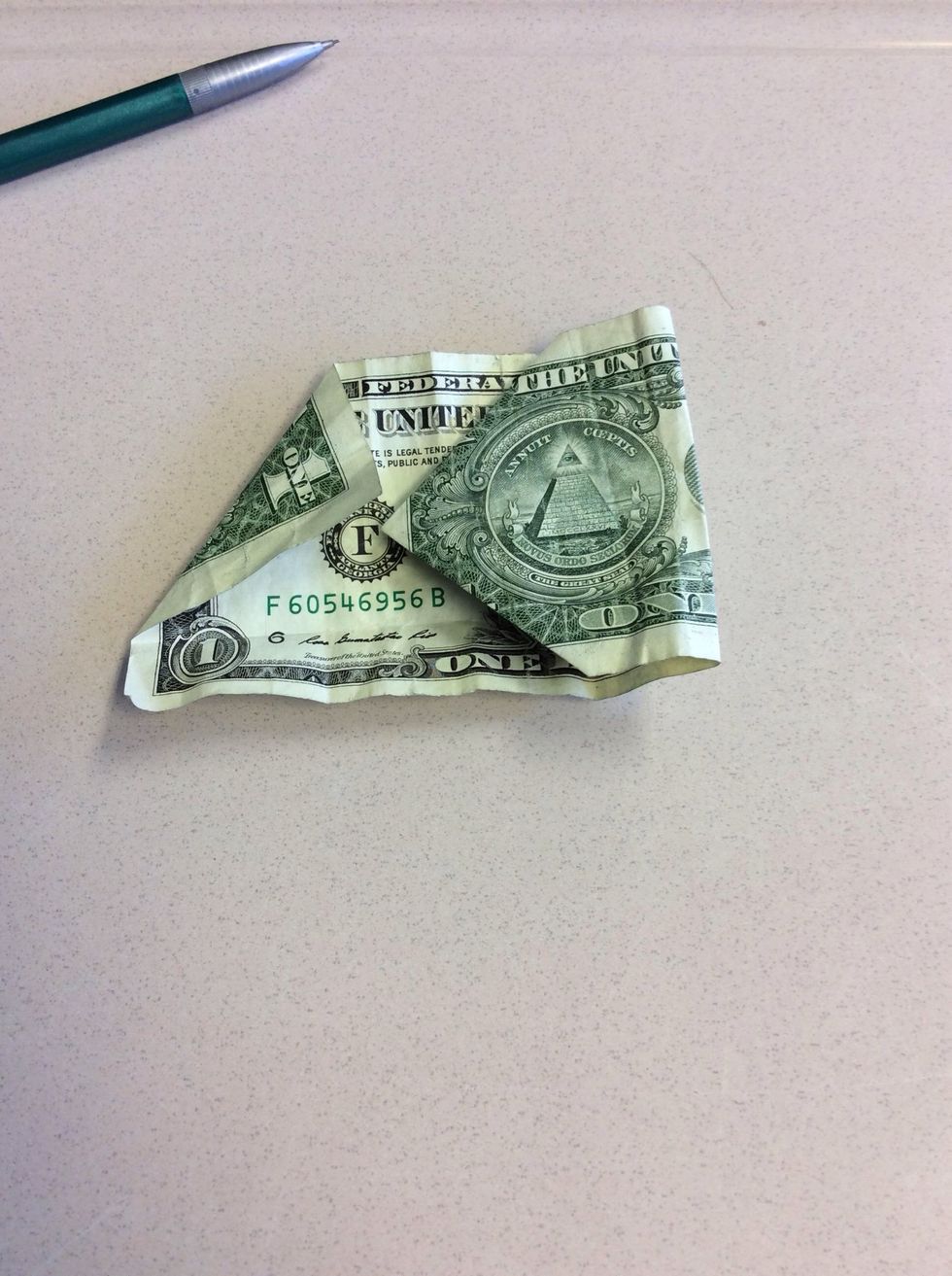 Then, you fold the right side in so both points touch.