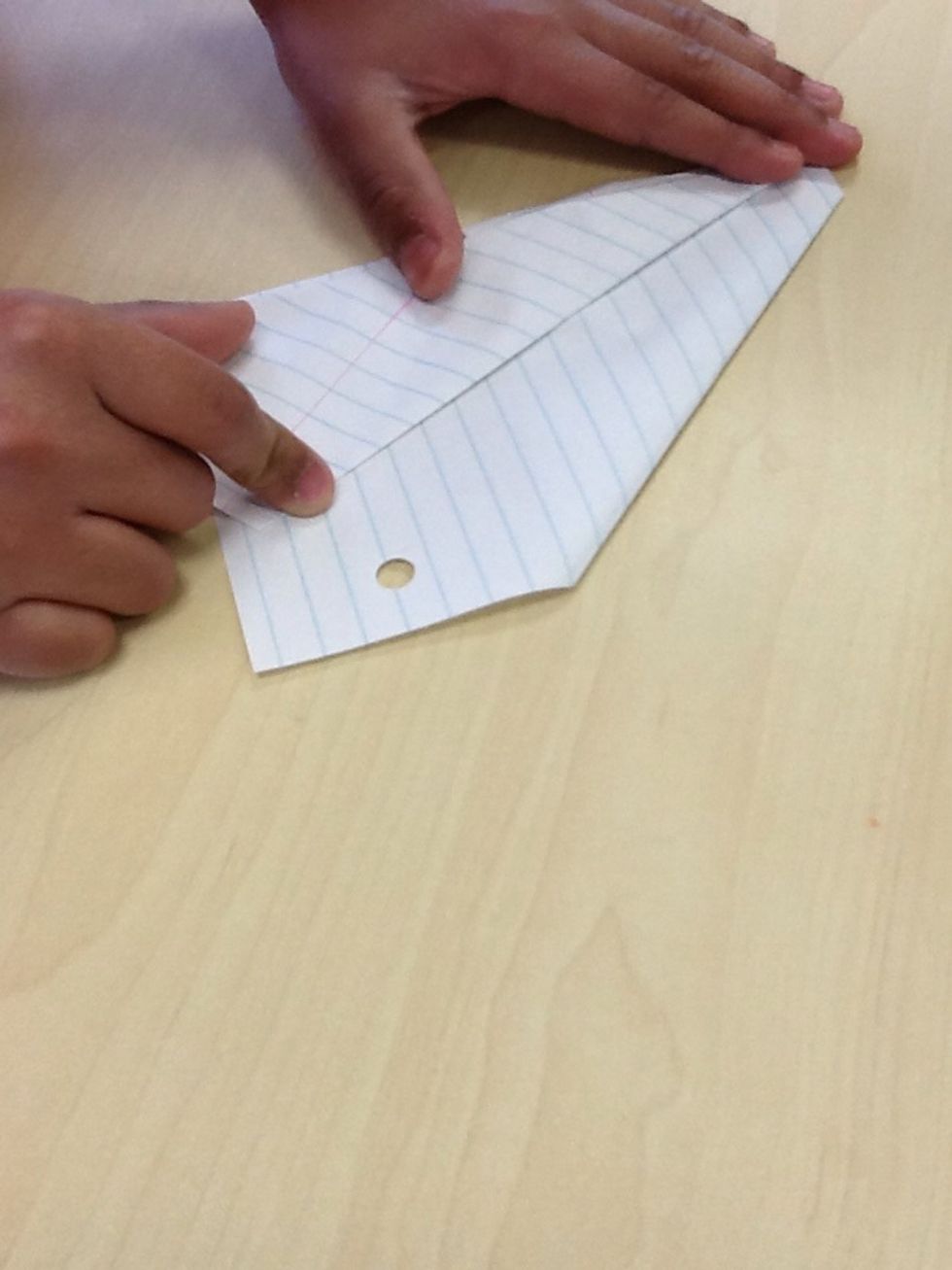 Then you fold the wing back