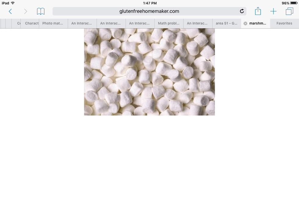 Then you get marshmallows then roast then wait until it's crispy then put it on the chocolate