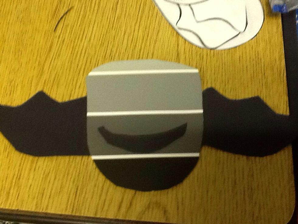 Then you glue the mouth on to the bat.