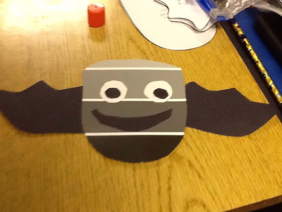 Then you glue the pupils into the middle of the bats eyes.