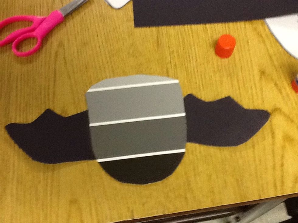 Then you glue the wings on the bat.