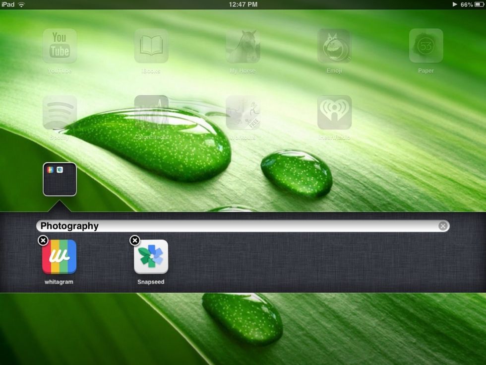 Then you'll need to press and drag any app onto another. In this folder, I will be placing photo editing apps. Make sure you put your apps in the correct folder category.