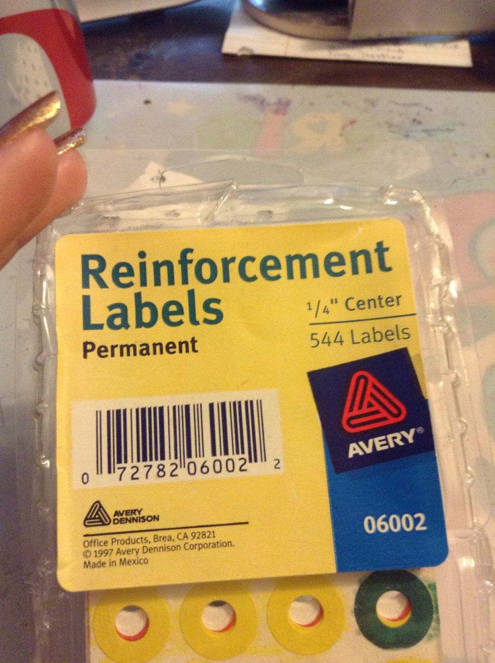 Then you need hole reinforcement labels.