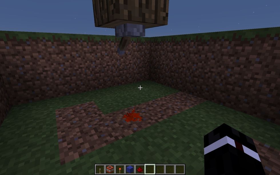 Then you put a lever under the stump of the tree, and turn it on. Also put Redstone under it.